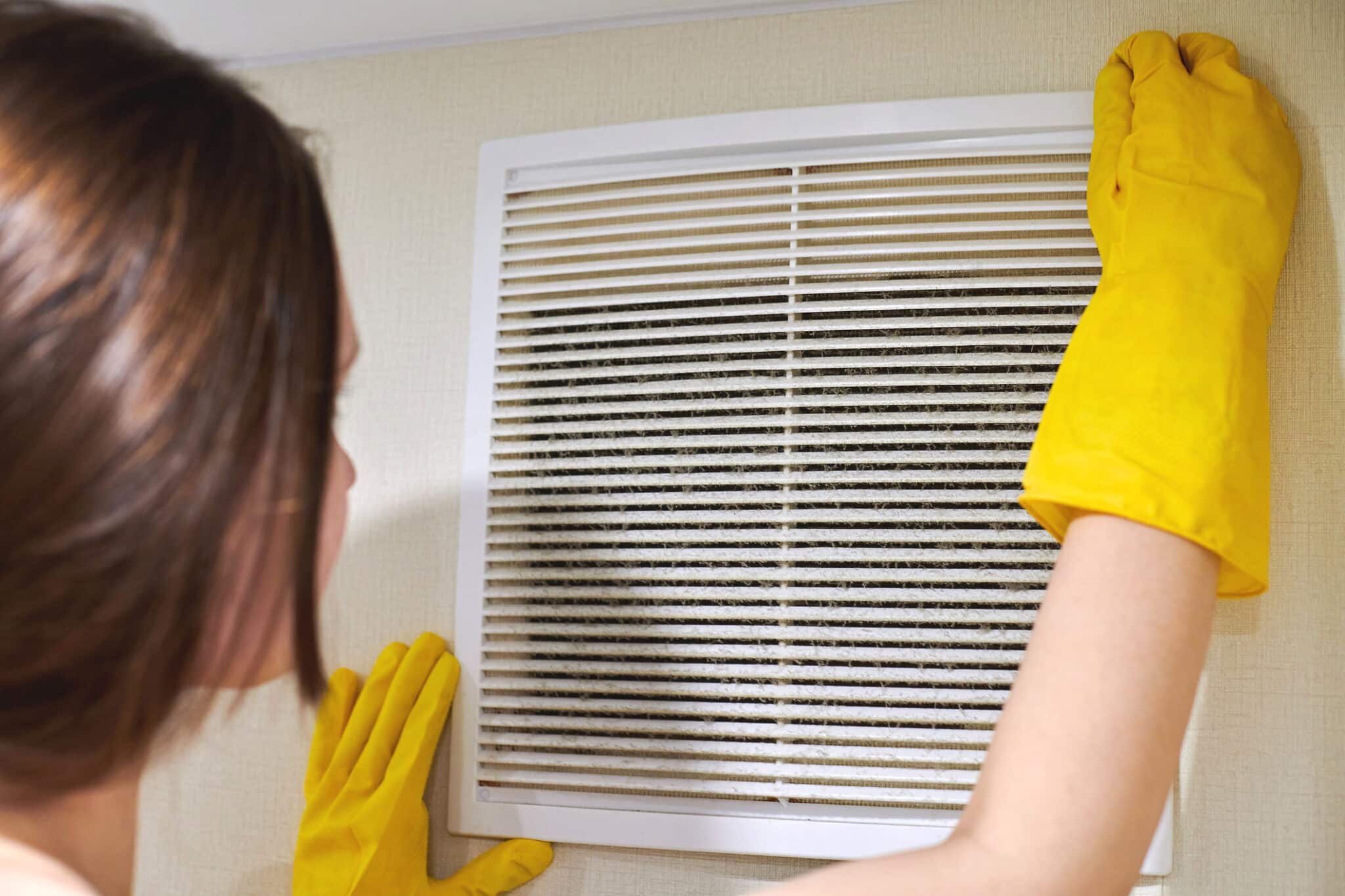 Holding ventilation grill of HVAC for cleaning or replacing, Duct Sealing.